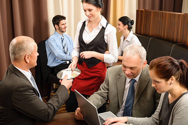 What is the role of a hotel management company?